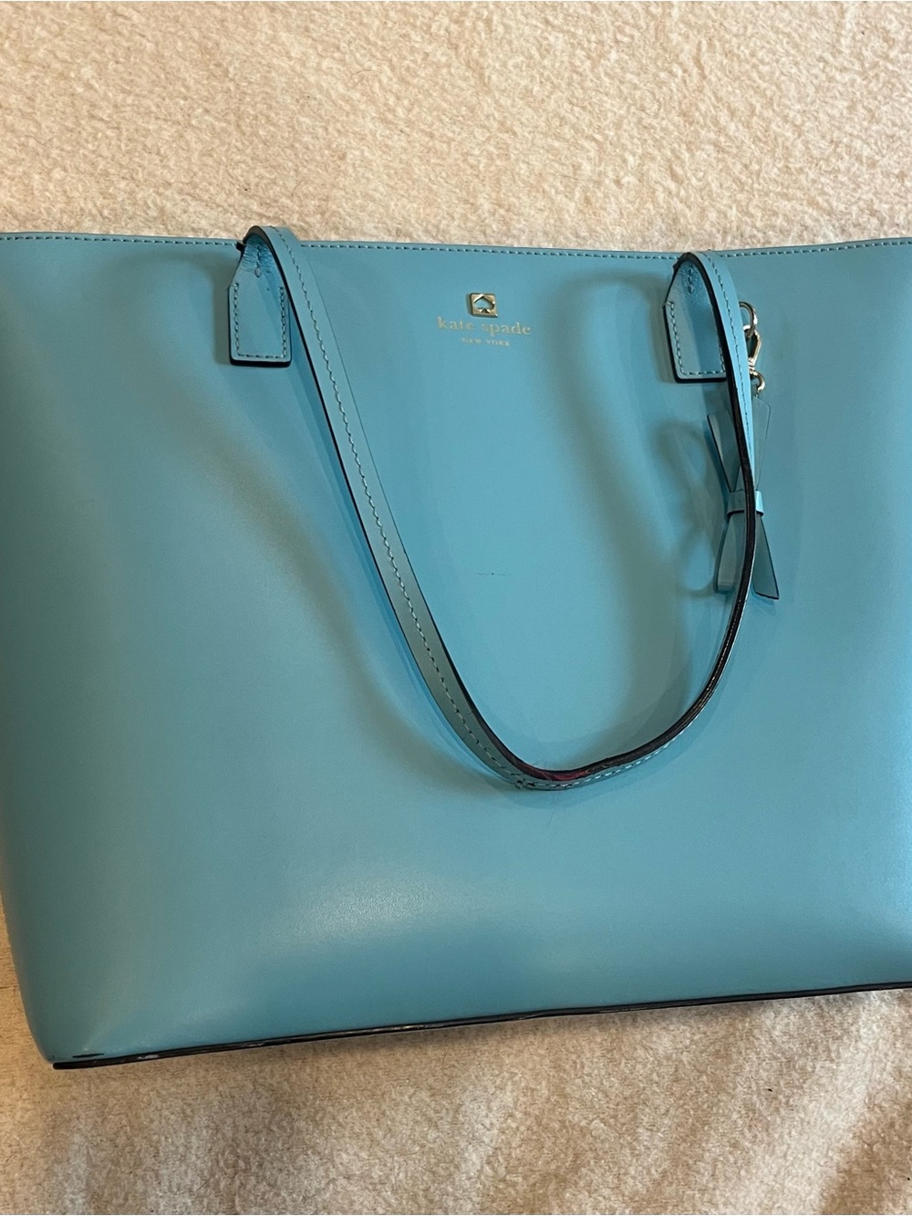 kate spade turquoise leather tote with gold logo